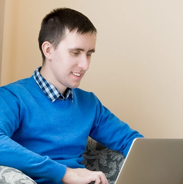 Student learning with laptop